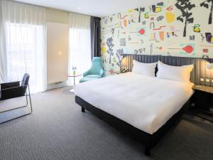 Krevet ili kreveti u jedinici u okviru objekta IBIS Styles Ulaanbaatar Polaris