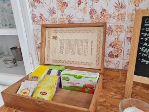 a box of food sitting on top of a table at Carlo's Beach Guest House in Praia de Odeceixe