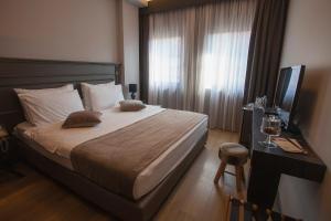 Postel nebo postele na pokoji v ubytování Solun Hotel & SPA