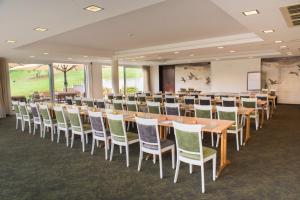 a conference room with tables and chairs in it at Hotel-Restaurant Birkenhof in Bad Soden-Salmünster