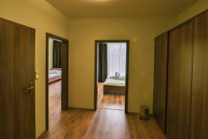 Postel nebo postele na pokoji v ubytování Hotel Aréna