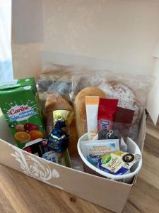 a box filled with different types of food at Hostal B and B Benidorm in Benidorm