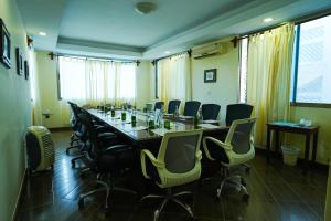 a large conference room with a long table and chairs at Seaclusion Diani in Diani Beach +63 photos