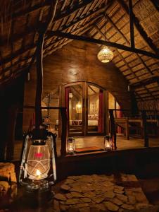 a room with a large window in a building at Gaga Bees Udawalawe in Udawalawe