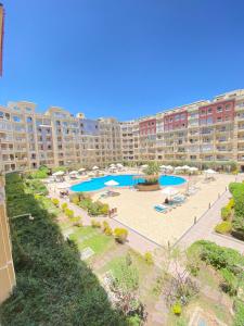 an aerial view of a large apartment complex with a swimming pool at florenza Resort - Hurghada Egypt in Hurghada