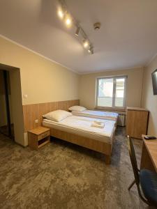 โทรทัศน์และ/หรือระบบความบันเทิงของ Hotel TM