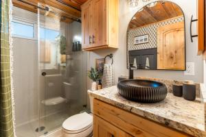 a bathroom with a sink and a shower and a toilet at Starlight Chalet Lake Tahoe in Carnelian Bay +74 photos