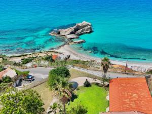 an aerial view of a beach and the ocean at Residence Araba Fenice Tropea in Tropea