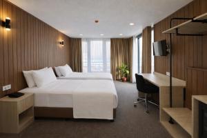 เตียงในห้องที่ Hotel Evsen +38 ภาพ