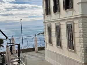 a building with a view of the ocean at Falanga Family Guests Accommodation in Civitavecchia
