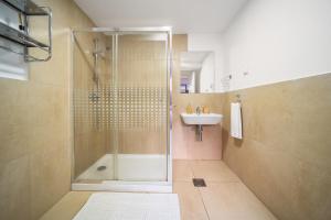 a bathroom with a shower and a sink at Funchal Paradise in Funchal +91 photos
