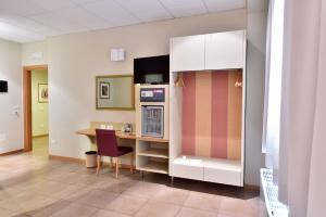 Cucina o angolo cottura di Tatì Hotel