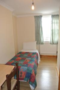 Postel nebo postele na pokoji v ubytování European Hotel