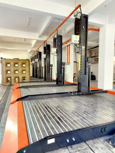 a fitness room with a gym with an empty treadmill at 118 Grand Hotel in George Town