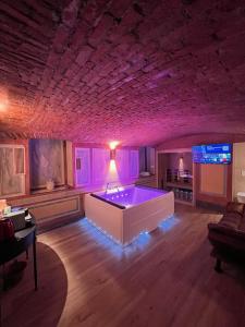 a large living room with a pool table in it at Emme Loft I Sweet Moon - Exclusive Loft & Private Spa Milan in Milan