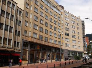 a large building with people walking in front of it at Continental Aparthotel Bogotá - Aparta Suite in Bogotá