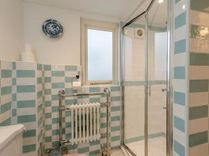 a bathroom with a shower and a sink at 4 Bed in Eastbourne oc-71297 in Eastbourne