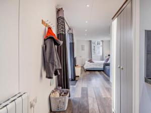 a hallway with a room with a bed at 1 Bed in Norwich oc-76493 in East Harling