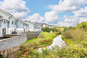 a river in front of houses and buildings at 2 Bed in Abersoch oc-p27804 in Abersoch