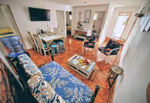 a living room with a couch and a table at MatSofy_Apartamento in Santiago