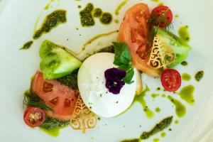 a plate of food with an egg and vegetables at St Helens Hotel, Dublin in Stillorgan