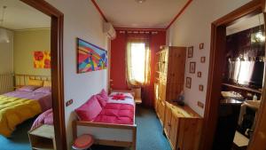 A bed or beds in a room at Le Magnolie B&B