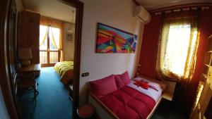 A bed or beds in a room at Le Magnolie B&B