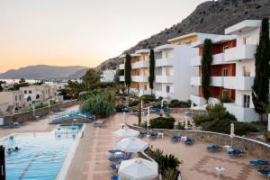 a view of a hotel with a swimming pool at Stella Hotel in Pefki