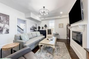 a living room with a couch and a tv at Pets Welcome! Family-Friendly Retreat in Culpeper in Culpeper