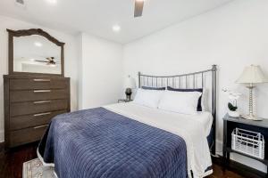 a bedroom with a bed and a dresser and a mirror at Pets Welcome! Family-Friendly Retreat in Culpeper in Culpeper