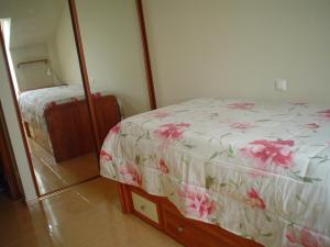 Cama o camas de una habitación en Piso de Gama