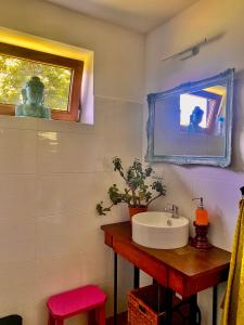 a bathroom with a sink and a mirror at Retro stodoła Siedlisko Klocówka Roztocze Całoroczna agroturystyka in Majdan Wielki