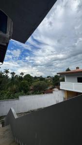 a view from the balcony of a house with a sky at Cantinho dos Pássaros Centro Penedo RJ in Penedo