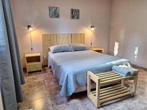 a bedroom with a large bed and two night stands at DaLi in Montecarlo