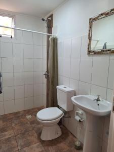a bathroom with a toilet and a sink at DaLi in Montecarlo
