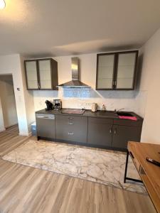 a kitchen with a sink and a counter top at WorkHome A2 zu 3 in Lünen