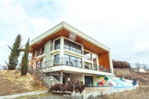 a house on top of a hill with at GM - Guesthouse in Choporti