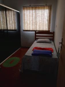 Giường trong phòng chung tại Real Hotel do Tatico