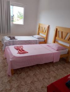 Giường trong phòng chung tại Real Hotel do Tatico