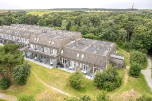 an overhead view of a large building on a field at Hollumerstrand in Hollum