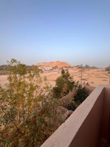 a view of the desert from the balcony of a building at Azru hotel siwa in Siwa