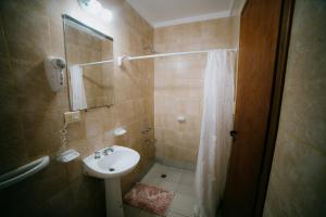 a bathroom with a shower and a sink at Río Hotel in Colorado River +112 photos