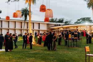 a group of people standing in front of a building at Tramonto hotel & ristorante in Empedrado