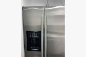 a stainless steel refrigerator in a kitchen at 3Bed 2Bath PRIVATE HOME Decatur in Decatur