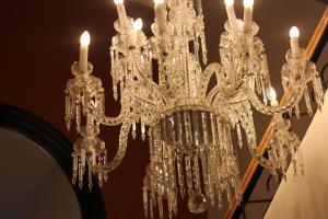 a chandelier hanging from a ceiling at Casa Mestiza in Guadalajara