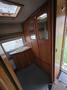 a bathroom in an rv with a sink at Prague Retro Challenge and Garden in Prague +123 photos
