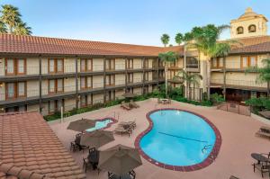 an overhead view of the courtyard of a hotel with a swimming pool at Embassy Suites by Hilton Lompoc Central Coast in Lompoc