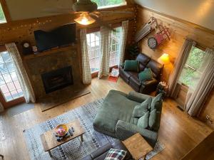 an overhead view of a living room with a couch and a fireplace at Turkey Ridge Retreat in Bryson City