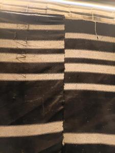 a close up of a black and white blanket at Rum Towers Luxury Camp in Aqaba