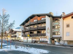 a building on the side of a street at Brixen Alpin Living Top 18 in Brixen im Thale